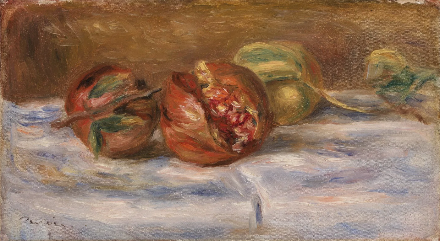 Two red pomegranates, one split open, beside a green fruit on a white cloth, in warm red, ochre, and pale blue