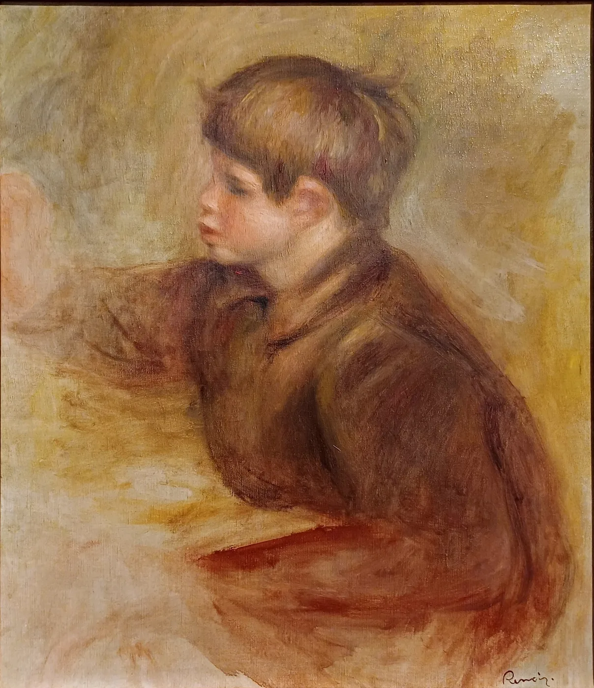 A boy in a brown jacket leans forward in profile, arm extended as if painting, against a loosely brushed golden background, in warm ochre, brown, and rust tones