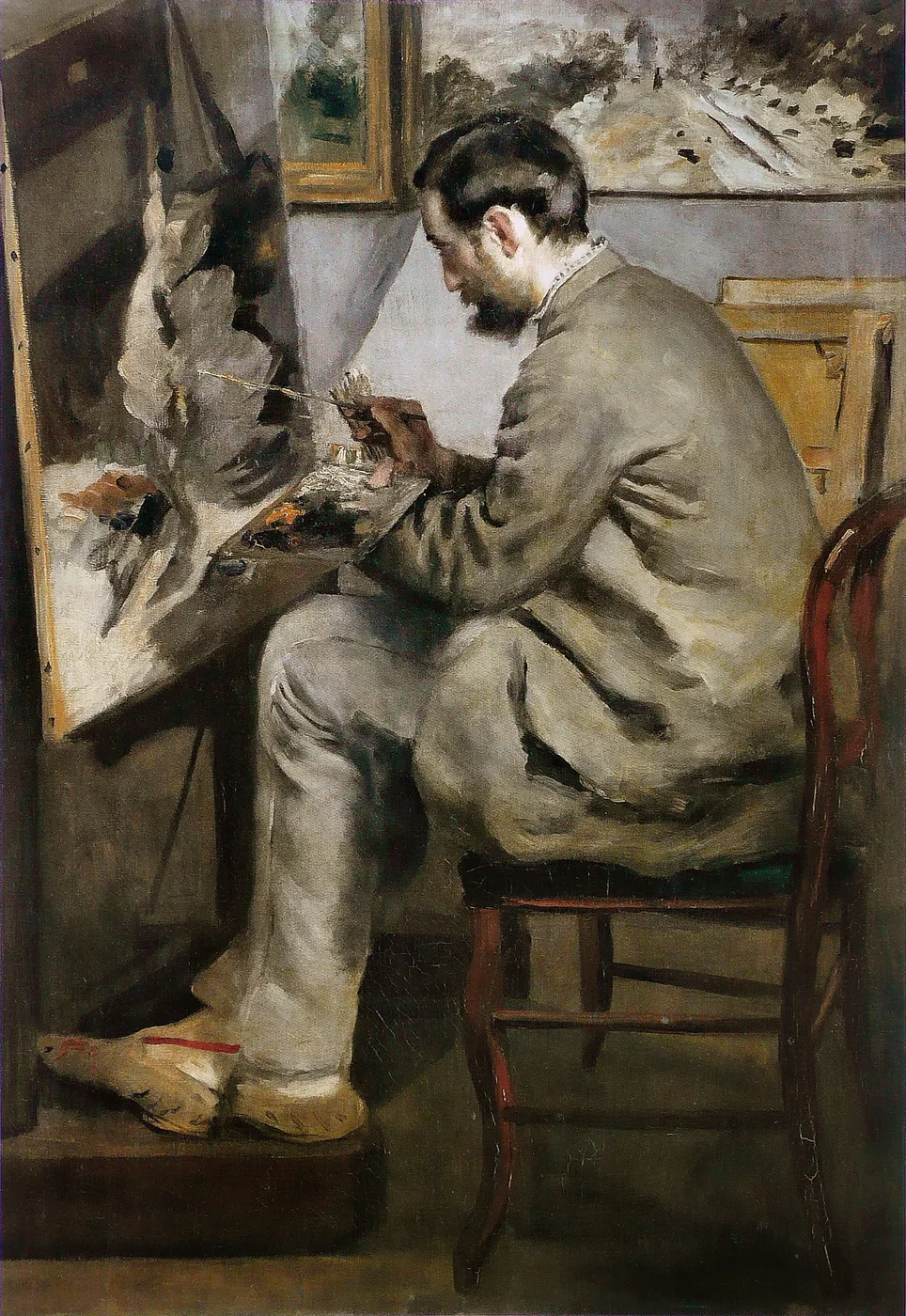 A bearded man seated on a chair painting at an easel in a studio, rendered in muted grey, brown, and pale ochre