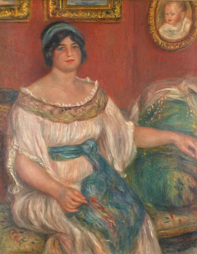 A seated woman in a white off shoulder gown with a teal sash holds a peacock feather fan, in front of a red wall hung with gilt framed pictures