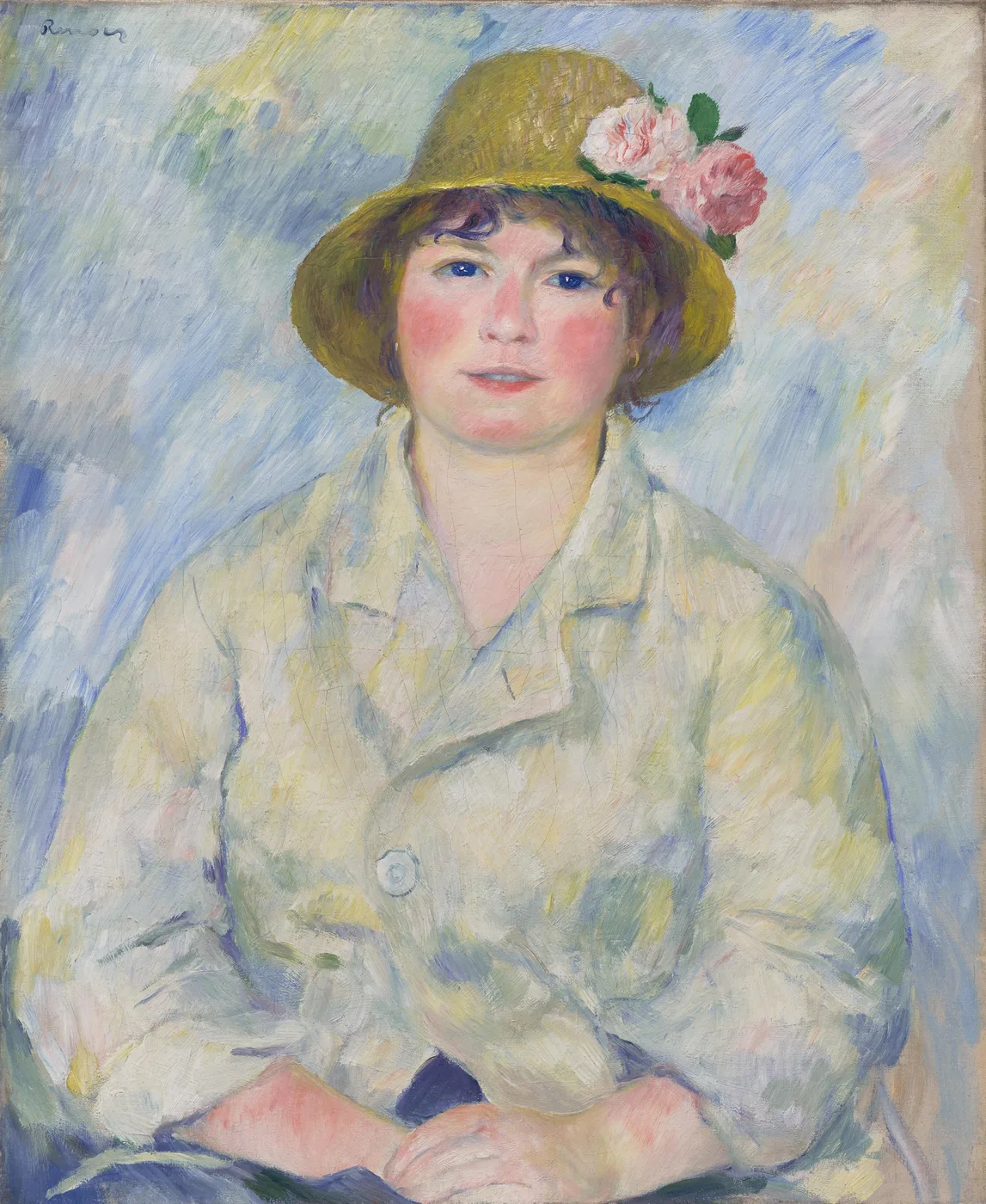 A rosy cheeked woman in a straw hat trimmed with pink roses wears a pale cream jacket, set against a soft blue background
