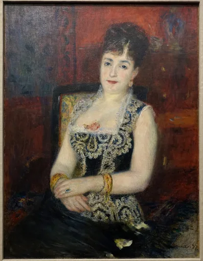 A seated countess in a black lace evening gown with gold bracelets poses against a deep red interior, in black, red, and pale skin tones.