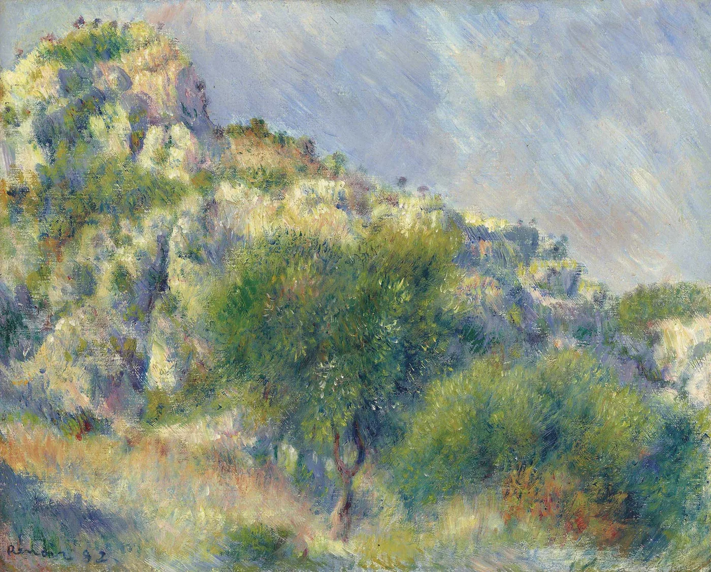 Sunlit pale rocks rise above green shrubs and a small tree, painted in bright dabs of white, blue, and green under a hazy sky.
