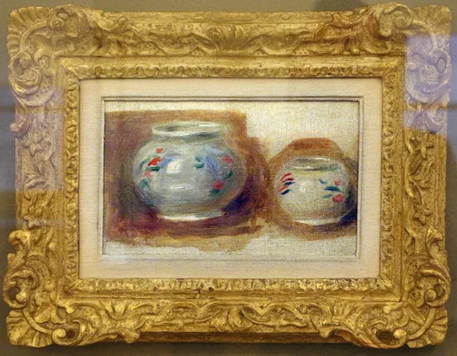 A small still life of two round-bellied ceramic vases painted with delicate floral sprigs, shown in an ornate gilded frame.