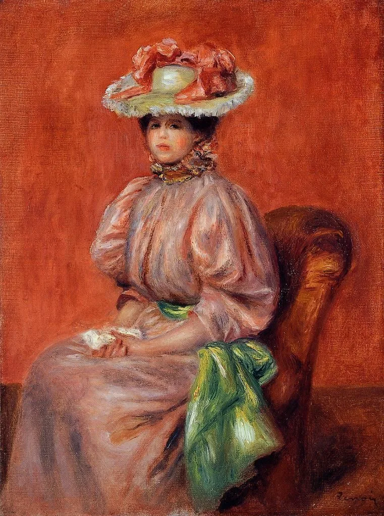 A seated woman in a wide hat trimmed with pink bows and a pale pink dress, against a deep orange red background