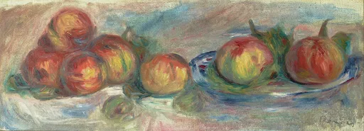 A long narrow arrangement of apples piled on a cloth and on a plate, in red, yellow, and green