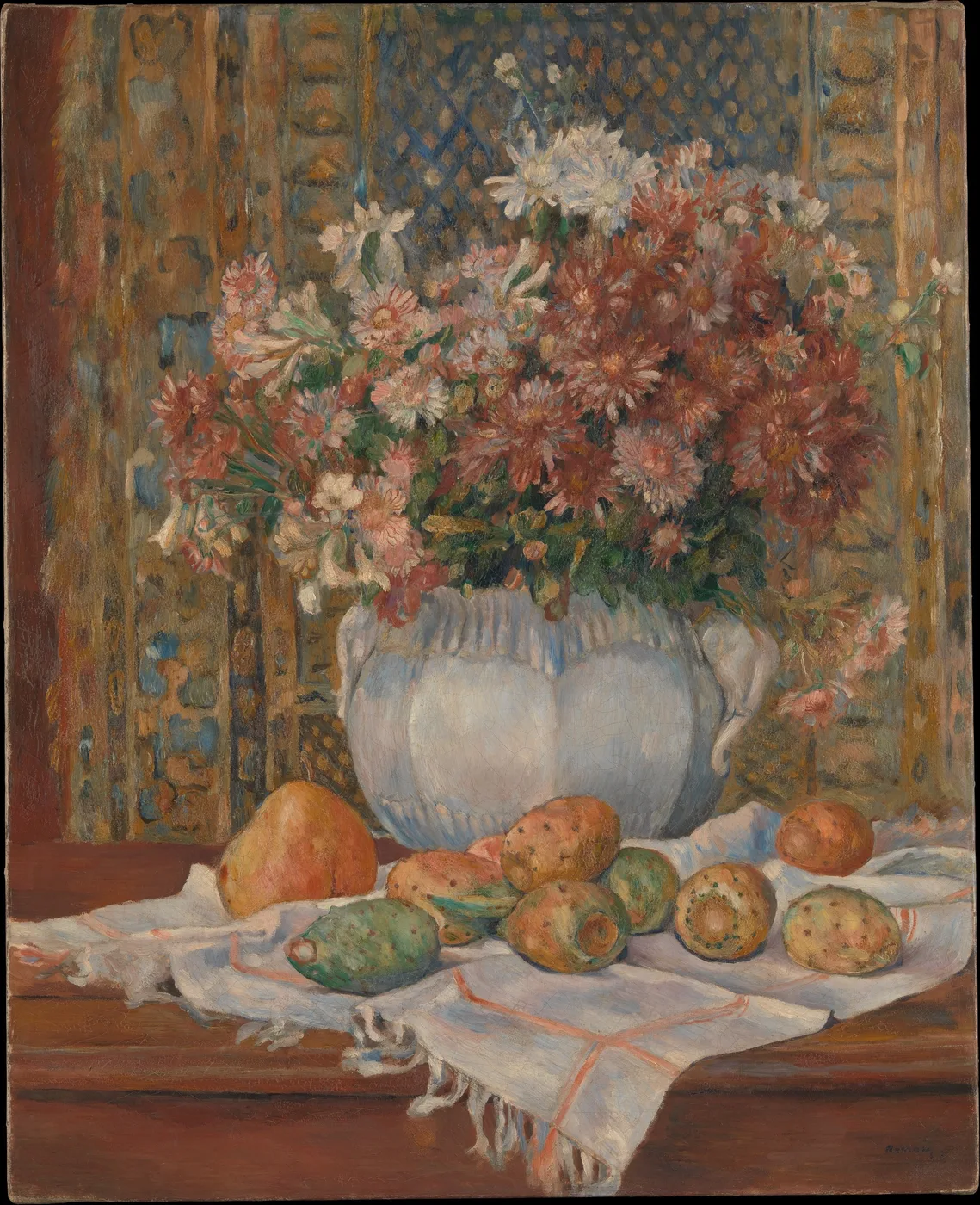 A white vase overflowing with pink and white blossoms above prickly pears on a cloth, in soft pink, cream, and olive green