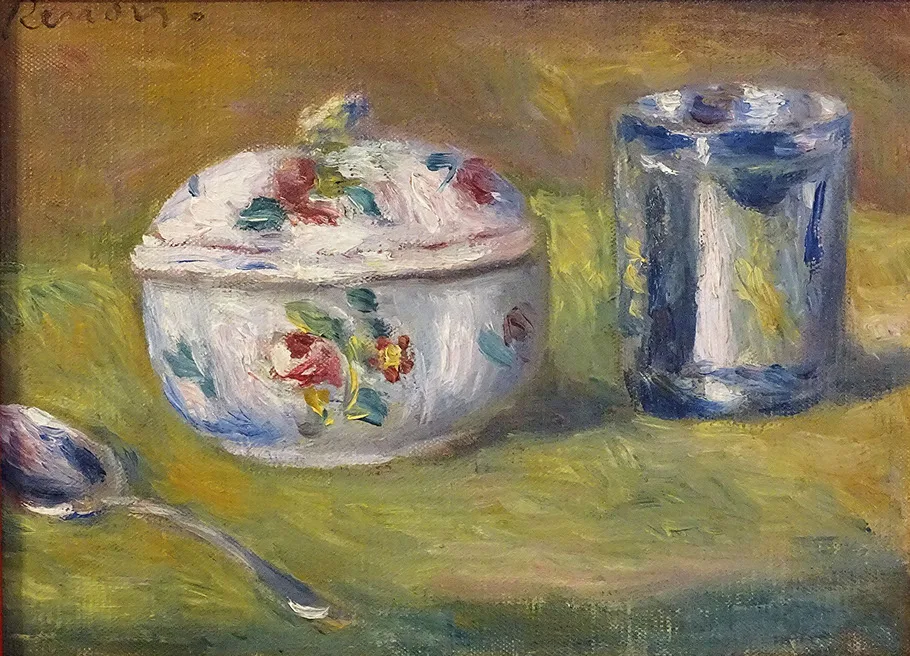 A floral sugar bowl, a silver cup, and a spoon on a yellow green tablecloth, in white, olive, and blue