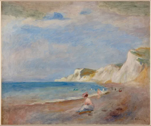 White chalk cliffs rise above a sandy beach where small figures gather by the blue sea under a cloudy sky.