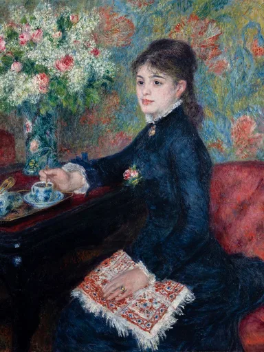 A woman in a dark blue dress stirring a cup of chocolate at a table with a large bouquet of white and pink flowers, in navy blue and rose pink