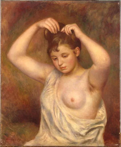 A bare-breasted young woman with a loose white slip raising both arms to arrange her hair, against a warm reddish brown background