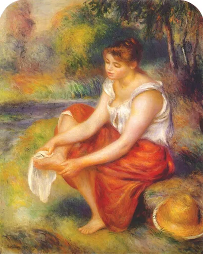 A woman in a red skirt seated by a stream drying her bare foot with a cloth, straw hat nearby, in green and orange