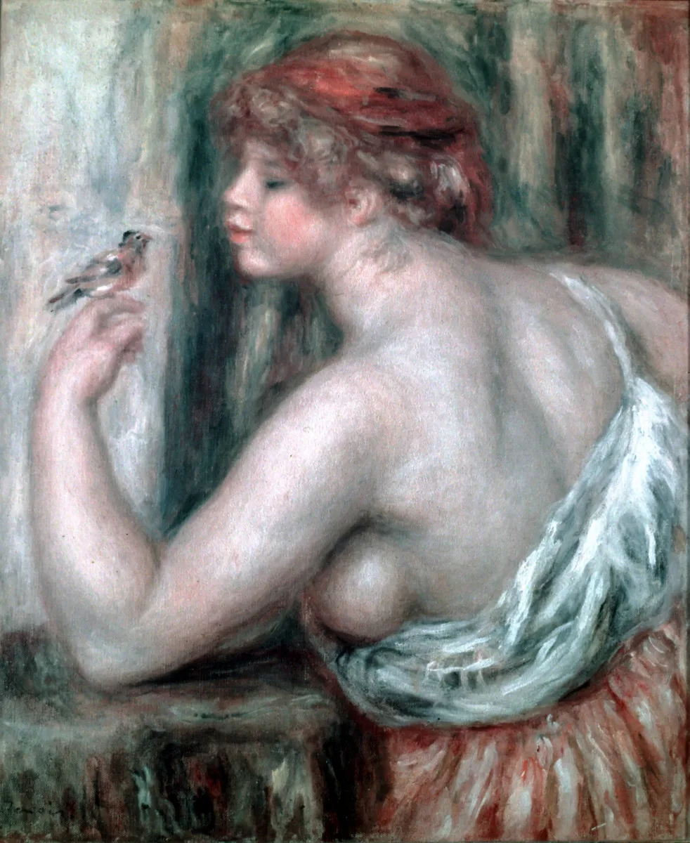 A bare-shouldered woman with red hair reaching toward a small bird perched on her hand, in soft flesh and green