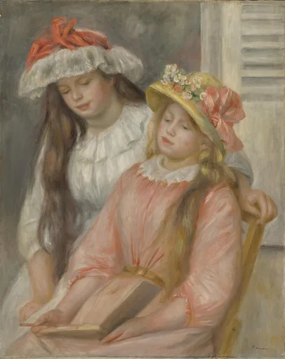 Two girls in flowered hats lean over an album together, one in a pink dress and one in white, in soft pink, cream, and grey tones