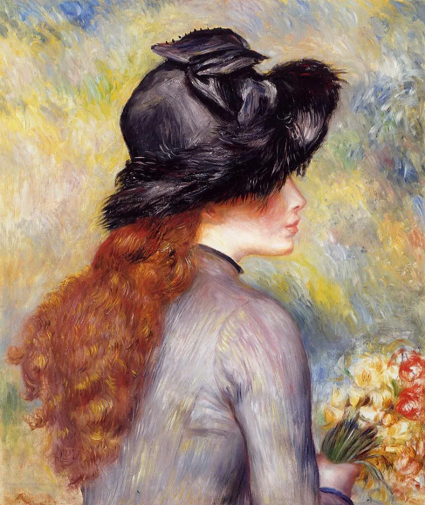 A young woman in a black feathered hat and grey coat holds a bouquet of red and yellow flowers, her red hair loose.