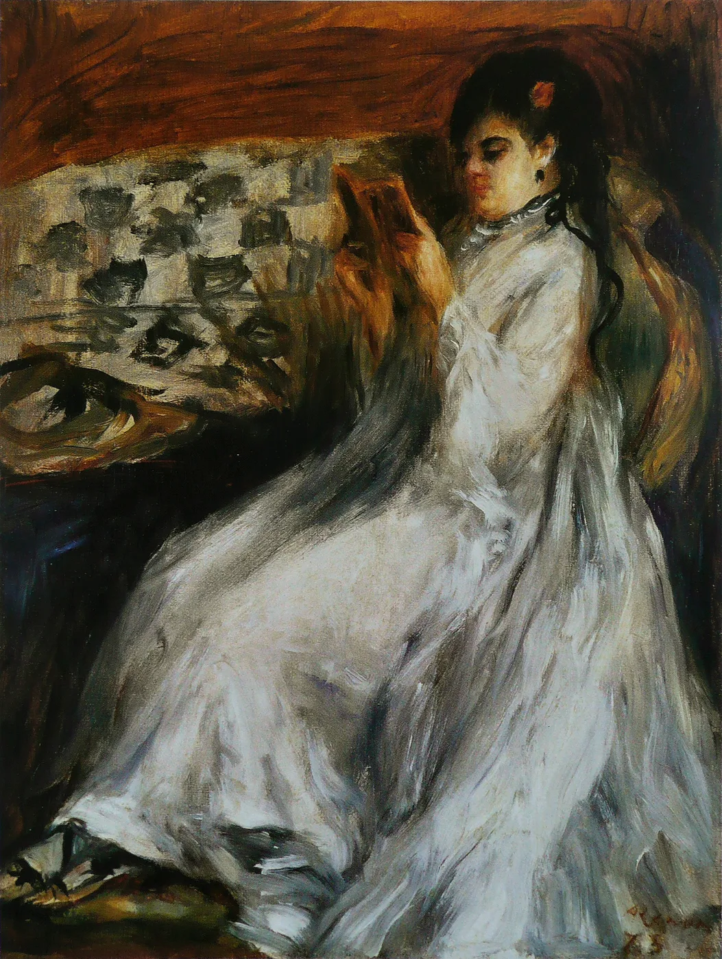 A woman with dark hair seated in a voluminous white dress, hands raised toward her chest, against a warm brown background