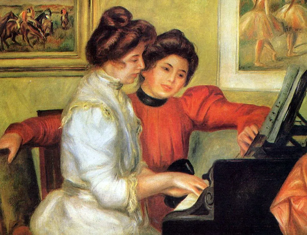 Two young women, one in white and one in orange-red, leaning together over sheet music at a black piano, against a yellow-green wall